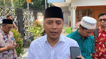 Eri Cahyadi Diantara Merah dan Kuning