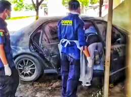 Kerangka Manusia Ditemukan Dalam Mobil Mangkrak di Aspol Gresik