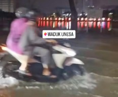 Selain Hujan Deras, Ini Penyebab Danau Unesa Lidah Meluap