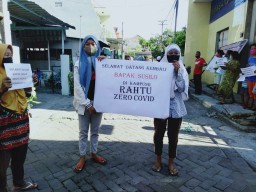 Begini Sambutan Warga ke Pasien Sembuh Covid-19 di Surabaya